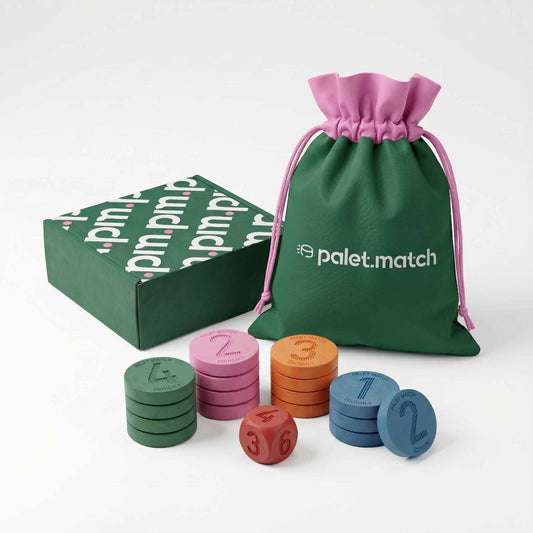 Jeu Palet Match – boîte verte, sac de transport en coton rose et 16 palets en caoutchouc naturel colorés