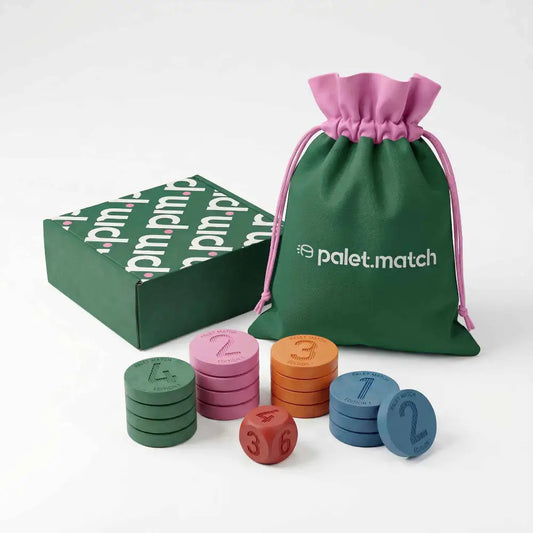 Jeu Palet Match – boîte verte, sac de transport en coton rose et 16 palets en caoutchouc naturel colorés